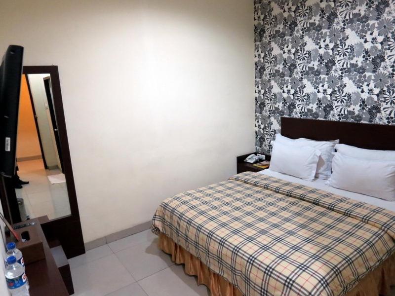 Vindhika Hotel Makassar Oda fotoğraf