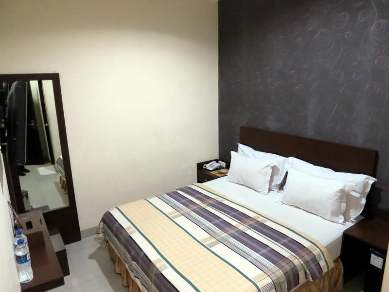 Vindhika Hotel Makassar Oda fotoğraf